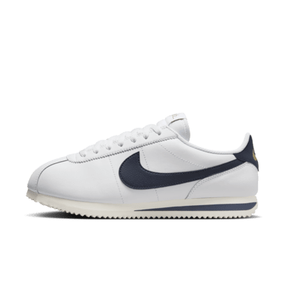 Nike black & gold cortez suede trainers hotsell